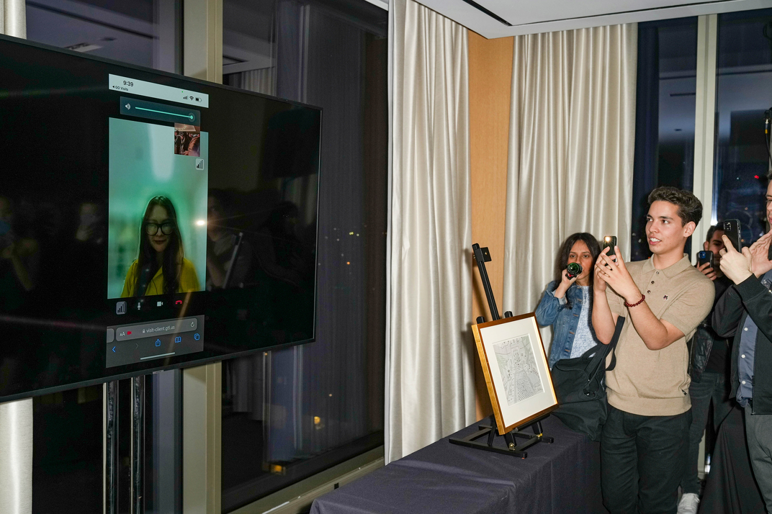 Photo by: John Nacion/STAR MAX/IPx 2022 5/19/22 Anna Sorokin (aka Anna Delvey) launched her solo art exhibit titled, "Allegedly" at the Public Hotel in New York City on May 19, 2022. She surprised her friends and fans by appearing in a video call from an ICE detention facility in Upstate New York wearing a yellow jumpsuit.