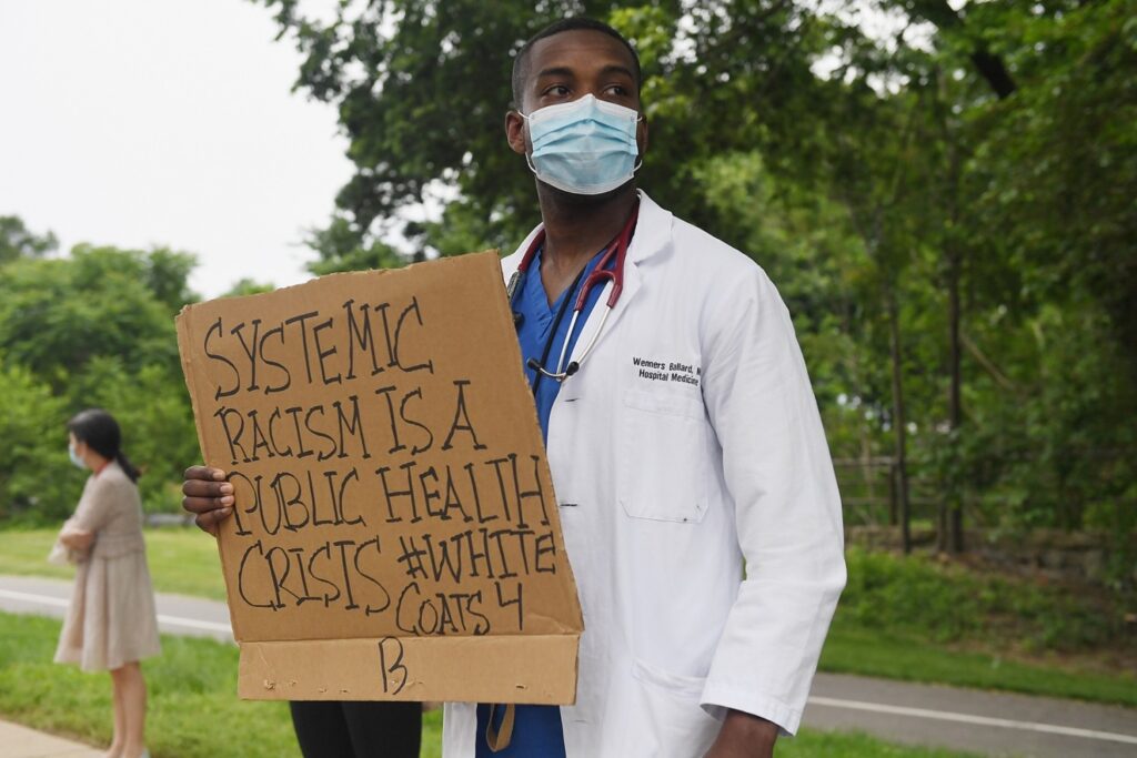 Several hundred doctors, nurses and medical professionals came together to protest against police brutality and the death of George Floyd at Barnes-Jewish Hospital on June 5, 2020 in St Louis, Missouri. 