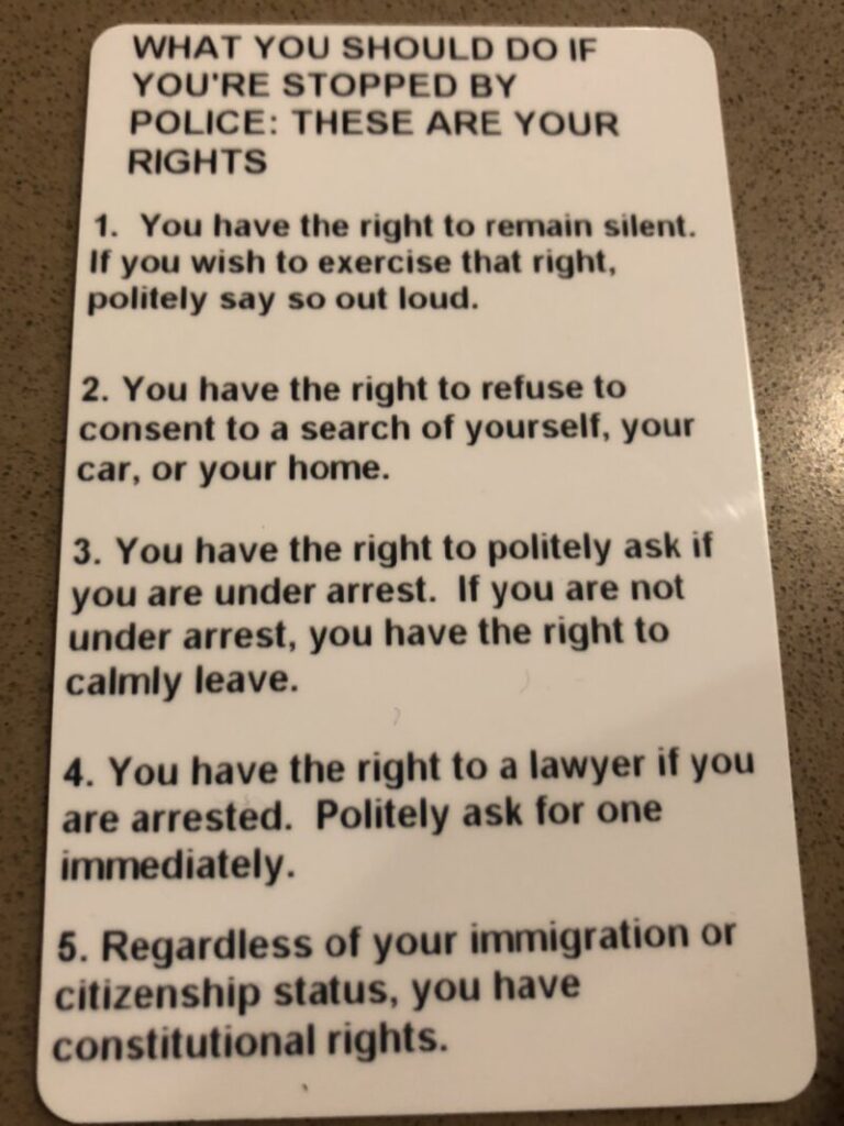 Instructions on what to do when stopped by the police are on the back of student IDs at Summit Academy in Red Hook, Brooklyn. (Eric Umansky/ProPublica)