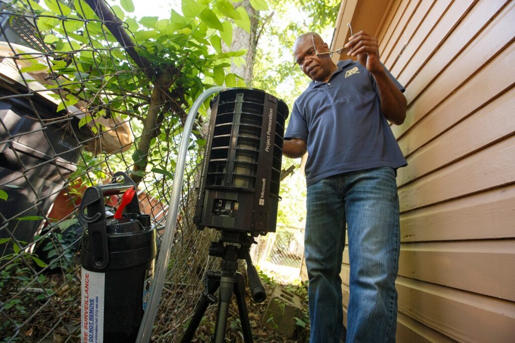 Max Vigilant, a surveillance entomologist with the Harris County Public Health's Mosquito & Vector Control, checks a Microsoft-designed smart mosquito trap in Houston, June 7, 2017. With 4.5 million people in a hot, muggy metropolis built atop a bayou, Houston is a perfect target for the mosquito-borne Zika virus. But it may be better prepared than any other urban center to stop an outbreak. (Michael Stravato/The New York Times)