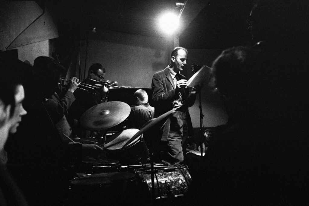 Accompanied by a backing band, American poet Lawrence Ferlinghetti gives a reading at the Jazz Cellar nightclub, San Francisco, California, February 1957. (Photo by Nat Farbman/The LIFE Picture Collection via Getty Images)
