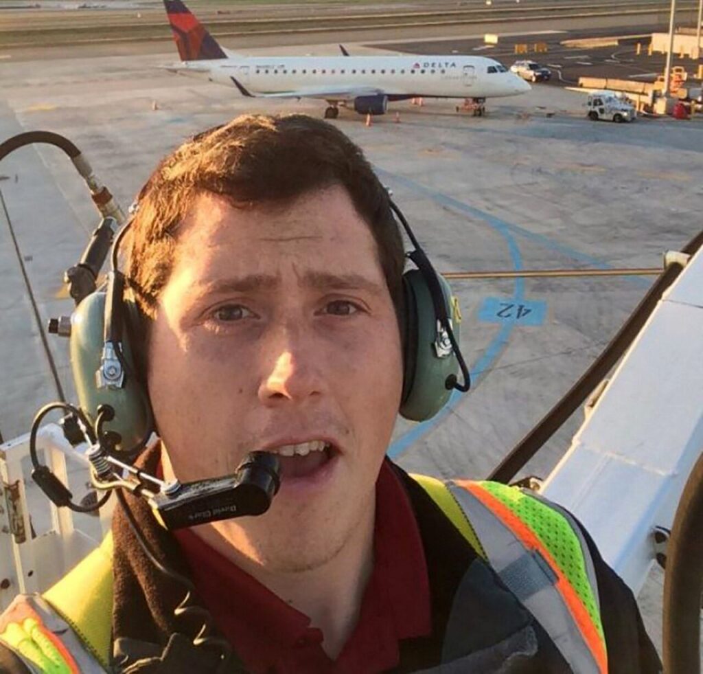 UNAUTHORIZED DEPARTURE: Russell took a job as a ground-service agent with Horizon Air in 2015, which afforded him free flights home to Alaska. “I lift a lot of bags — soooooo many bags,” he said.