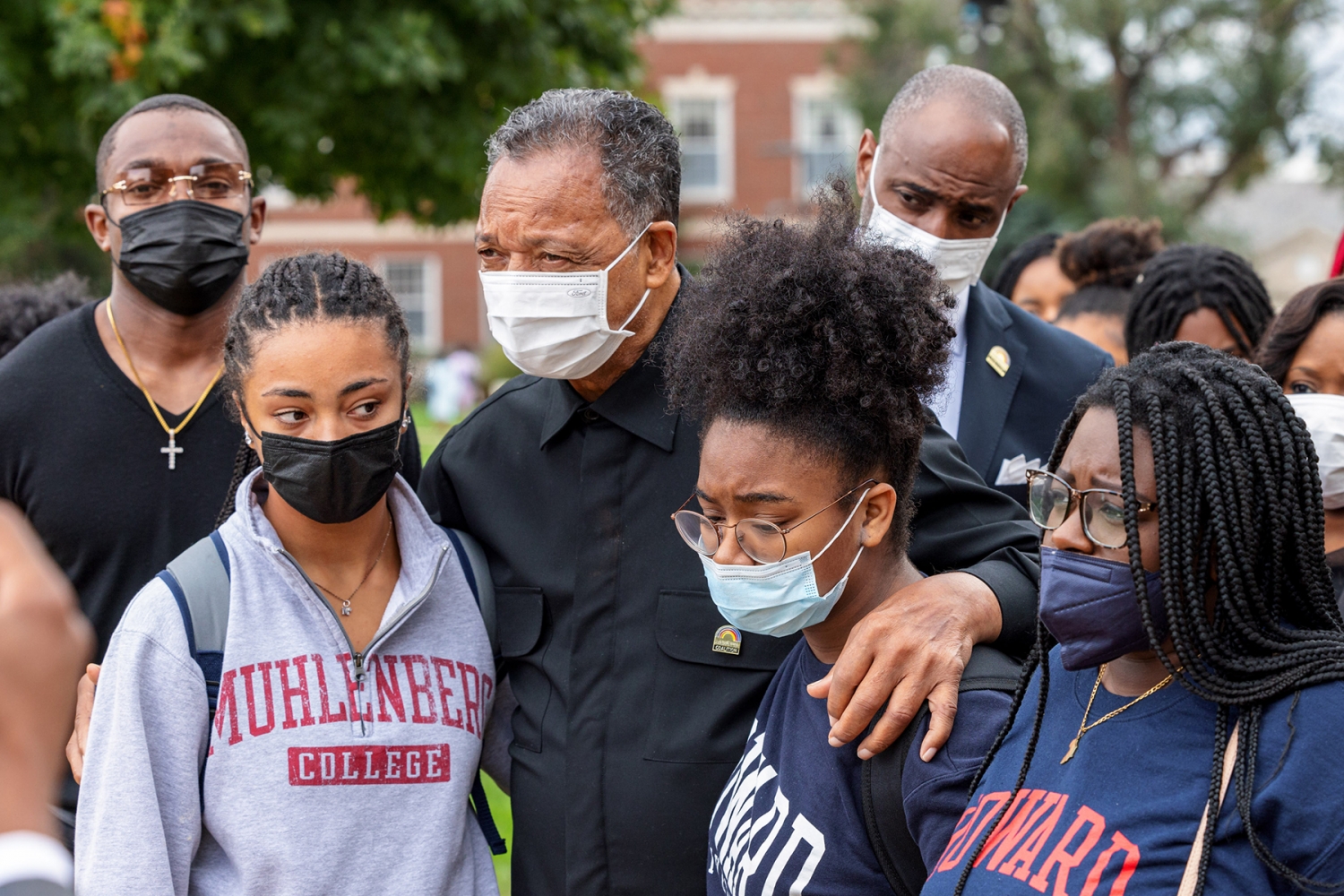 Channing Hill (second from right) and Erica England (right) headed inside of the Armour J. Blackburn Center with Rev. Jesse Jackson (center) on Sunday, Oct. 31, after Sunday’s Chapel service.