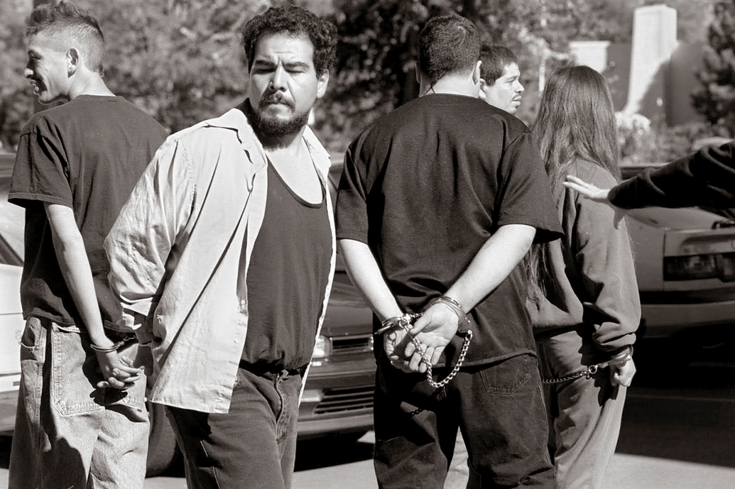 Caption as published: New Mexican file photoFrom left, Larry Martinez, Halbert Martinez, Jimmy Martinez and Donna Martinez are led into U.S. District Court in Santa Fe on Sept. 29, 1999, during the aftermath of a massive raid in Chimay— and Santa Cruz. Raw caption: No Original From left, Larry Martinez, Halbert Martinez, Jimmy Martinez and Donna Martinez are led into US District Court in Santa Fe on September 29, 1999. Photograph by Julie Graber for the Santa Fe New Mexican, 30 September 1999. © 2004 The New Mexican, Inc. All rights reserved. Reprinted with permission.Caption