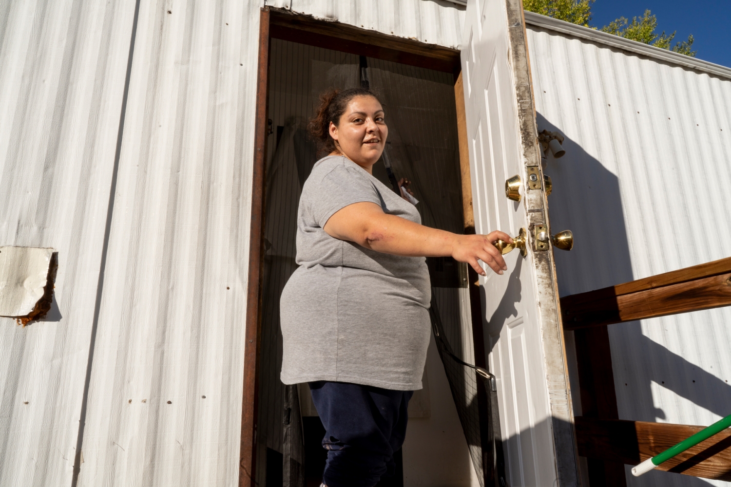 Francesquita Martinez at her mother’s mobile home in Chimayó. Martinez was 8-years-old when federal agents burst into her family’s home, threw her father to the floor and arrested him while she watched and wept.